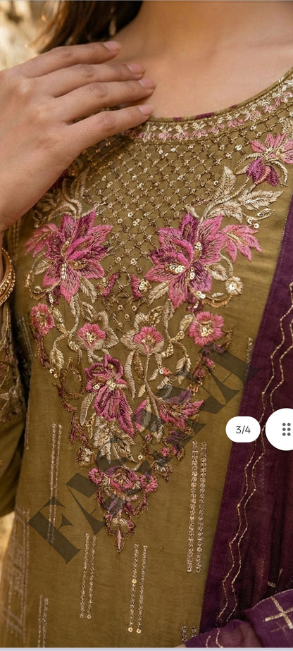 This is an unstitched lawn collection 3-piece suit with sequence embroidered front, embroidered sleeves, embroidered trouser, and a Bamber embroidered chiffon dupatta..