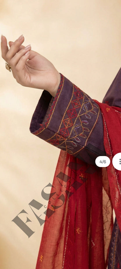 This is an unstitched lawn collection 3-piece suit with sequence embroidered front, embroidered sleeves, embroidered trouser, and a Bamber embroidered chiffon dupatta.