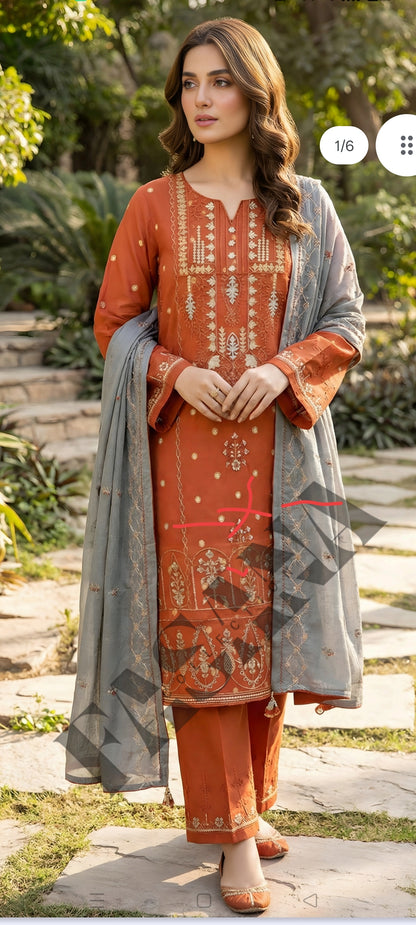 This is an unstitched lawn collection 3-piece suit with sequence embroidered front, embroidered sleeves, embroidered trouser, and a Bamber embroidered chiffon dupatta.