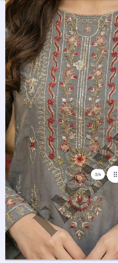 This is an unstitched lawn collection 3-piece suit with sequence embroidered front, embroidered sleeves, embroidered trouser, and a Bamber embroidered chiffon dupatta.