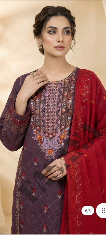 This is an unstitched lawn collection 3-piece suit with sequence embroidered front, embroidered sleeves, embroidered trouser, and a Bamber embroidered chiffon dupatta.