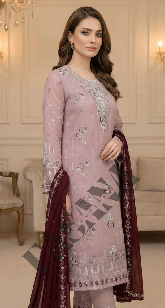 .This is an unstitched lawn collection 3-piece suit with sequence embroidered front, embroidered sleeves, embroidered trouser, and a Bamber embroidered chiffon dupatta.