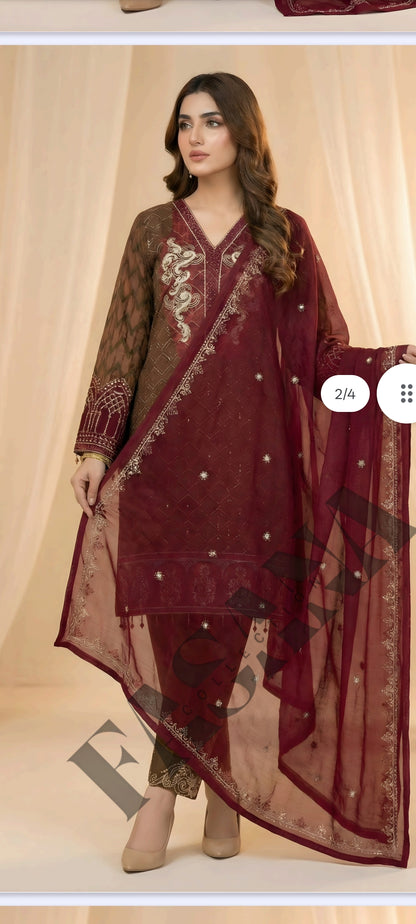 This is an unstitched lawn collection 3-piece suit with sequence embroidered front, embroidered sleeves, embroidered trouser, and a Bamber embroidered  chiffon dupatta.