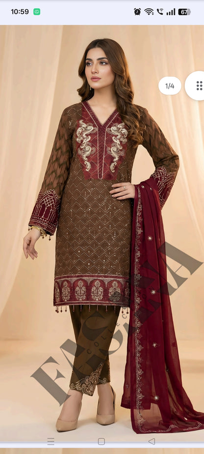 This is an unstitched lawn collection 3-piece suit with sequence embroidered front, embroidered sleeves, embroidered trouser, and a Bamber embroidered  chiffon dupatta.