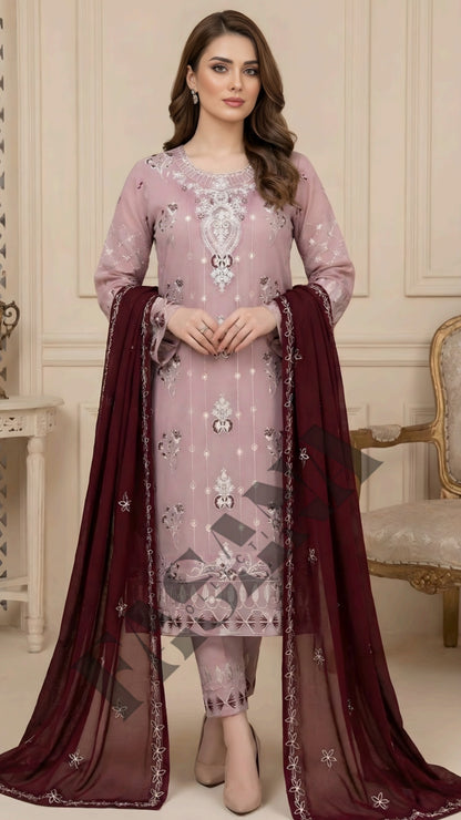 .This is an unstitched lawn collection 3-piece suit with sequence embroidered front, embroidered sleeves, embroidered trouser, and a Bamber embroidered chiffon dupatta.