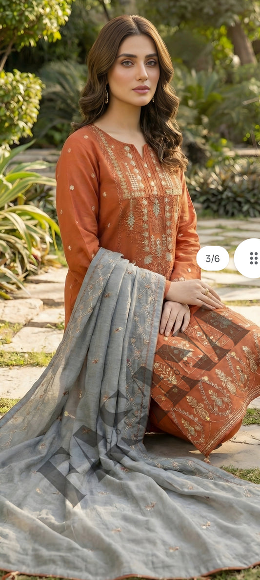 This is an unstitched lawn collection 3-piece suit with sequence embroidered front, embroidered sleeves, embroidered trouser, and a Bamber embroidered chiffon dupatta.