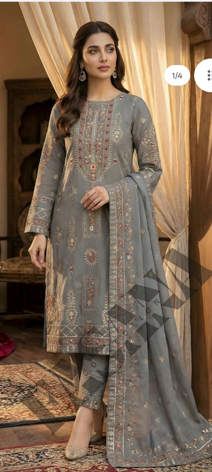 This is an unstitched lawn collection 3-piece suit with sequence embroidered front, embroidered sleeves, embroidered trouser, and a Bamber embroidered chiffon dupatta.